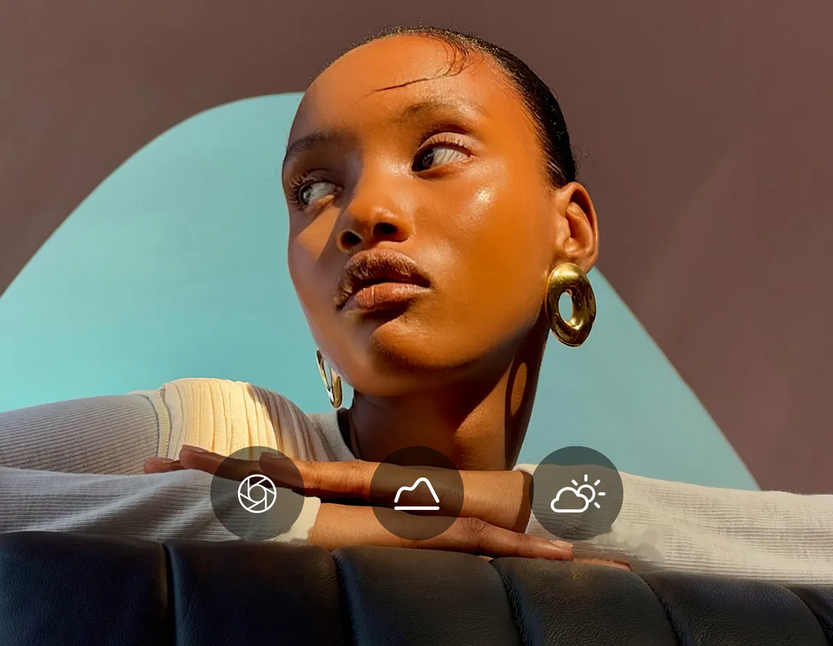 Portrait of a woman in golden light, shot on iPhone 18 Pro