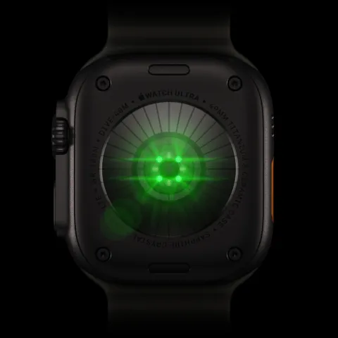 The back of Apple Watch Ultra 4, its heart sensors glowing green